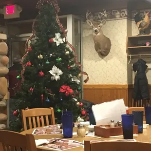 a christmas tree in the dining room