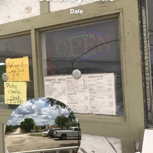 a sign in the window of a restaurant
