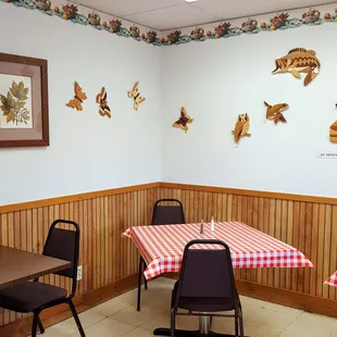 Interior, with woodcuts on the wall