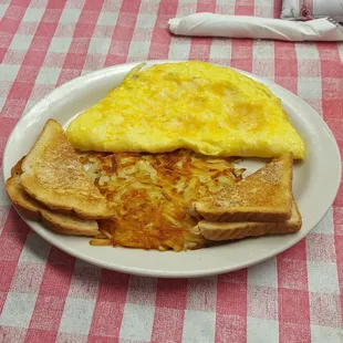 Cheese omelette and toast with a side of hash browns