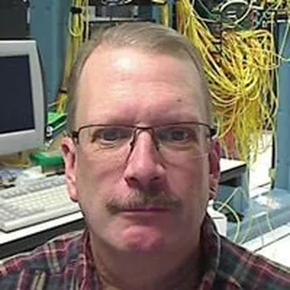 Mark E.