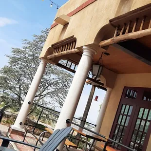 a row of chairs outside a restaurant