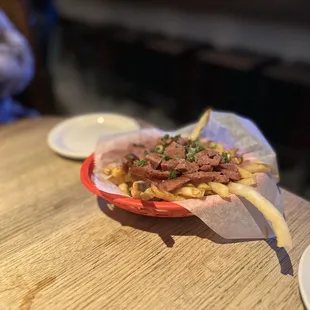 Queso fries with sausage