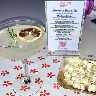 Soma 75 cocktail &amp; buttered herbed popcorn