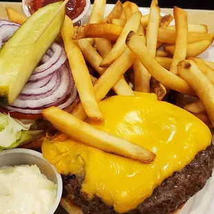 a burger and fries on a plate