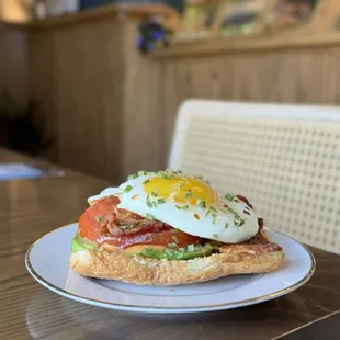 a breakfast sandwich on a plate