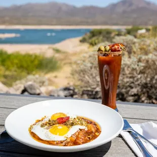 a plate of food and a drink