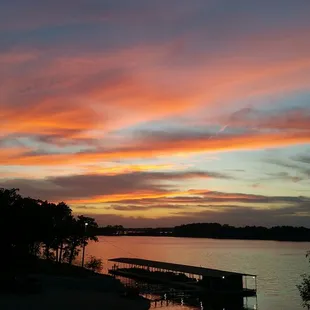 a sunset over a lake