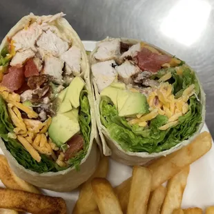 a chicken wrap and fries