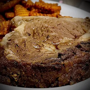 a plate of steak and sweet potatoes