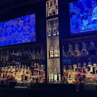 Bar area, televisions with sports on, and a great selection of spirits