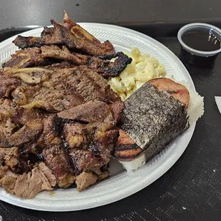 Cove Platter (spicy pork, galbi, bulogi) with a side of spam musubi