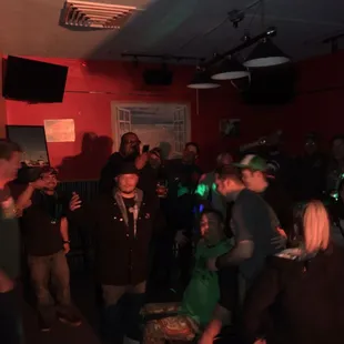 a group of people in a bar