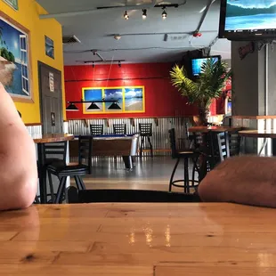 a man sitting at a table in a restaurant