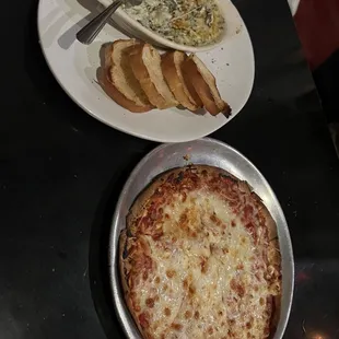 Rockefeller Spinach Artichoke Dip and cheese pizza.