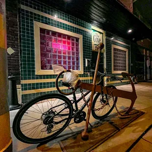a bicycle parked in front of a building