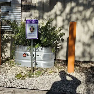 a sign in front of a building