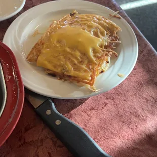 Hash browns with cheese and onion