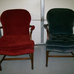 Chairs going from faded blue to luxurious red.