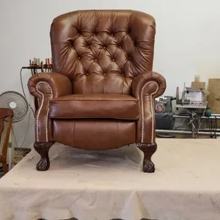 Large recliner recovered with leather.