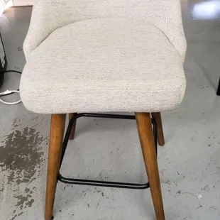 Bar stool with repaired broken back.