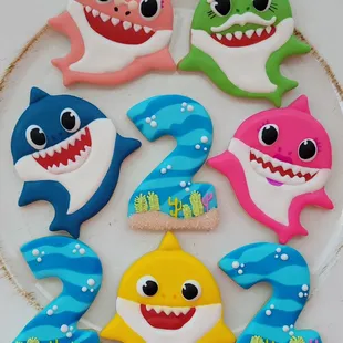 a plate of baby shark cookies