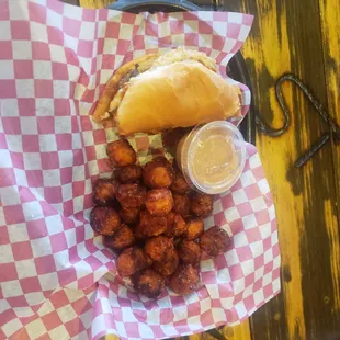 Bar Ute burger with sweet  potato tots. My friend and I split an order of this delicious meal. What is pictured is a half order.