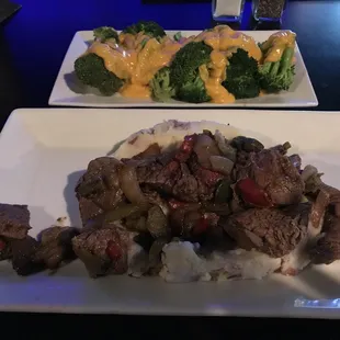 Sirloin beef tips over mashed potatoes/ Broccoli w/ Cheese