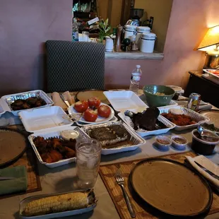 Ribs, chicken wings, jerk tofu. Side table (not pictured, too hungry) 1/2 pan salad, 1/2 pan corn bread and 2 lbs brisket.