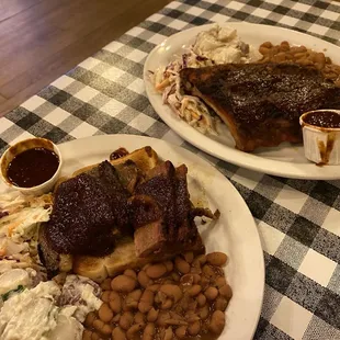 Brisket. Baby back Ribs. Beans. Coleslaw. Potato salad