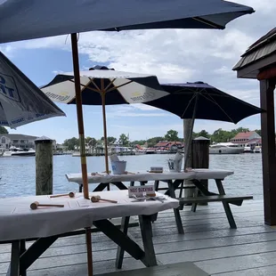 a woman sitting at a picnic table