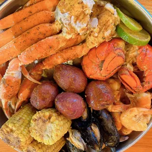a bowl of seafood and corn