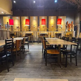 a restaurant with tables and chairs