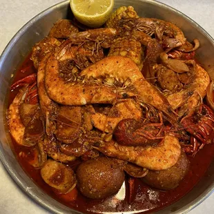2 lb. Boiling Seafood - Shrimp Head On + 1 lb. Boiling Crawfish with sausage, potato, and corn in Cajun seasoning