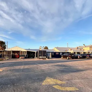a parking lot with cars parked in it