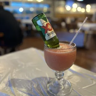 a drink in a glass with a straw