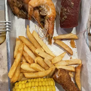 Shrimp, sausage, fries, chicken and corn
