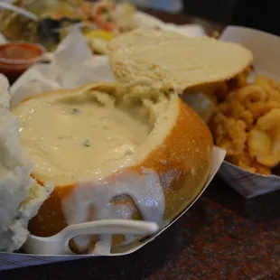 a bowl of soup and a sandwich