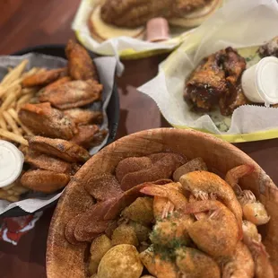 Shrimp special, fish sandwich, garlic Parmesan wings, and hot garlic wings