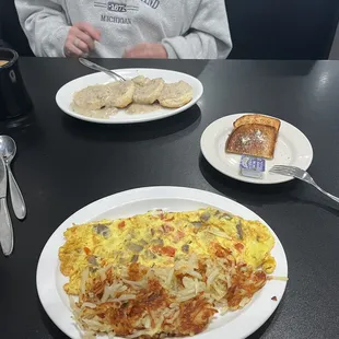 Greek omelette, sausage gravy and biscuits.