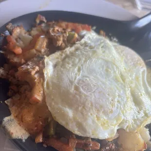 Poncho Skillet with Ober Medium eggs .