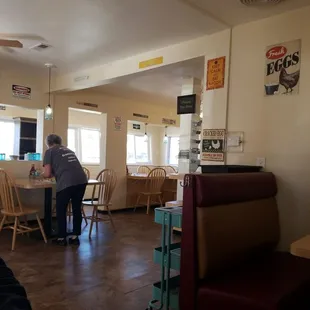 a man standing in a restaurant