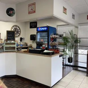 a woman sitting at the counter