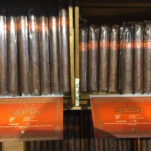 a shelf of cigars