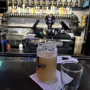 a pint of beer and a glass of water