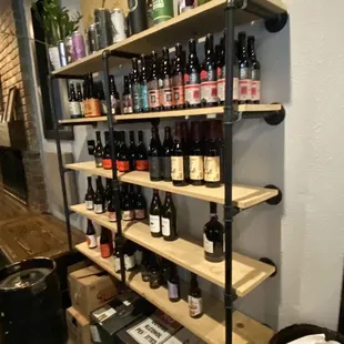 a wine rack with bottles of wine