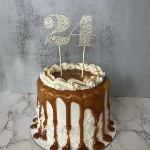 Custom vanilla-coconut-caramel cake.