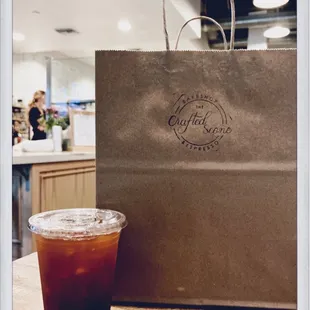 Grabbing an order to go! Peach Bellini tea and a bunch of scones plus a caprese and a Turkey scone which