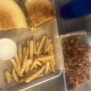 Mike Tyson with fries and onion strings