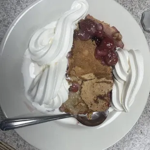 Cherry cobbler with vanilla ice cream